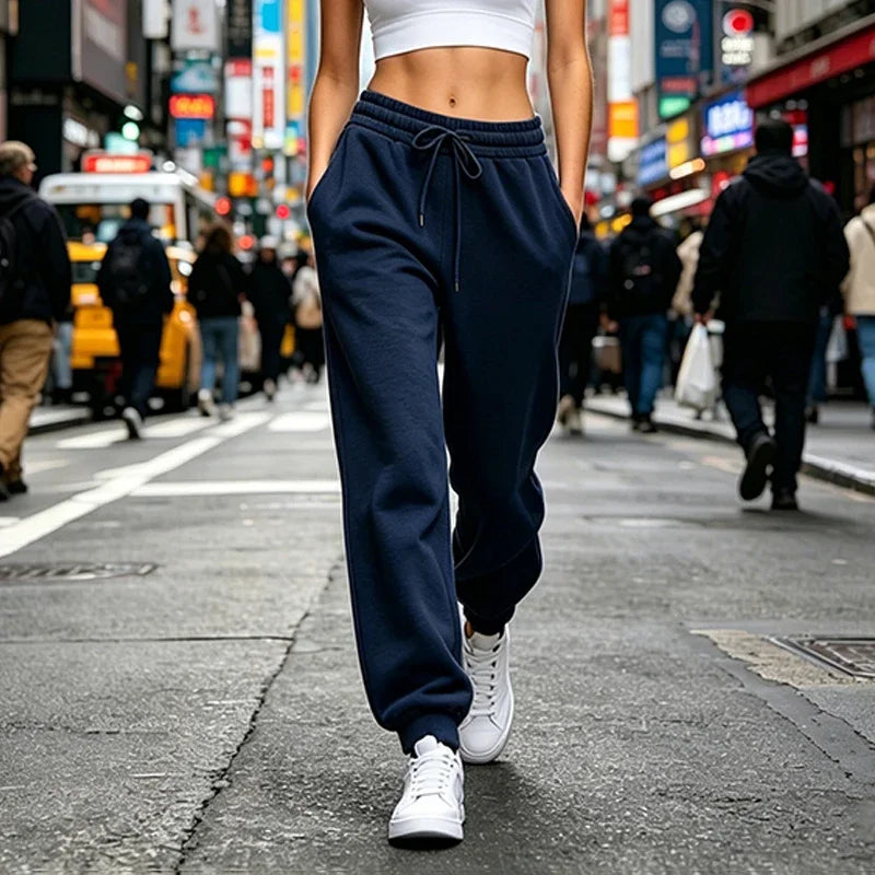 Pantalón deportivo recto de mujer con bolsillos