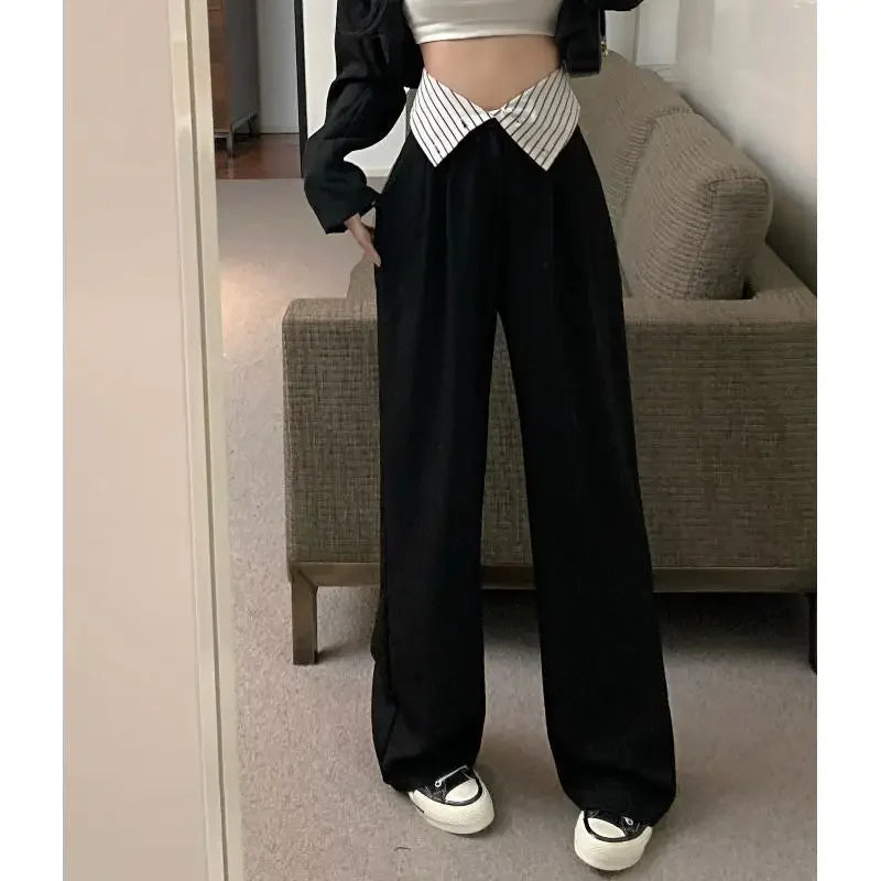 Pantalón negro de mujer de cintura alta con bolsillos