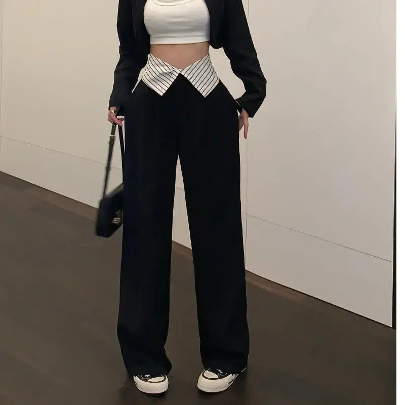 Pantalón negro de mujer de cintura alta con bolsillos