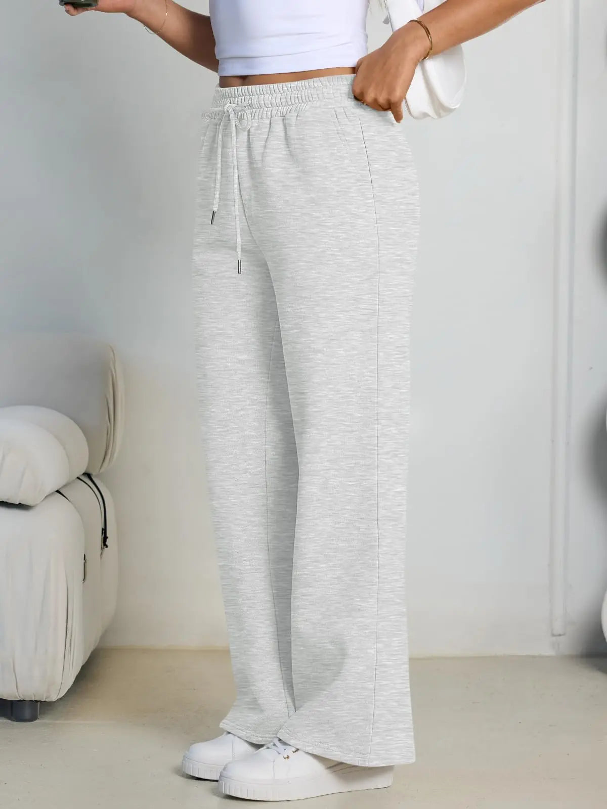 Pantalón deportivo gris de mujer de pernera ancha