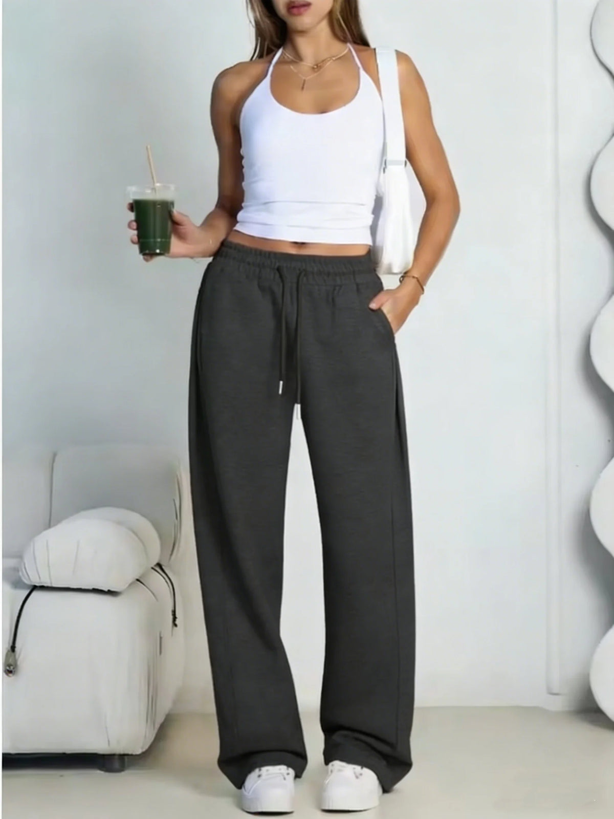 Pantalón deportivo gris de mujer de pernera ancha