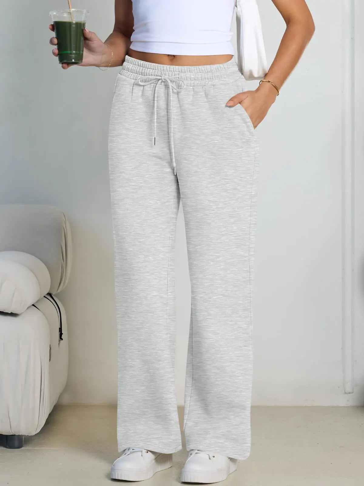 Pantalón deportivo gris de mujer de pernera ancha