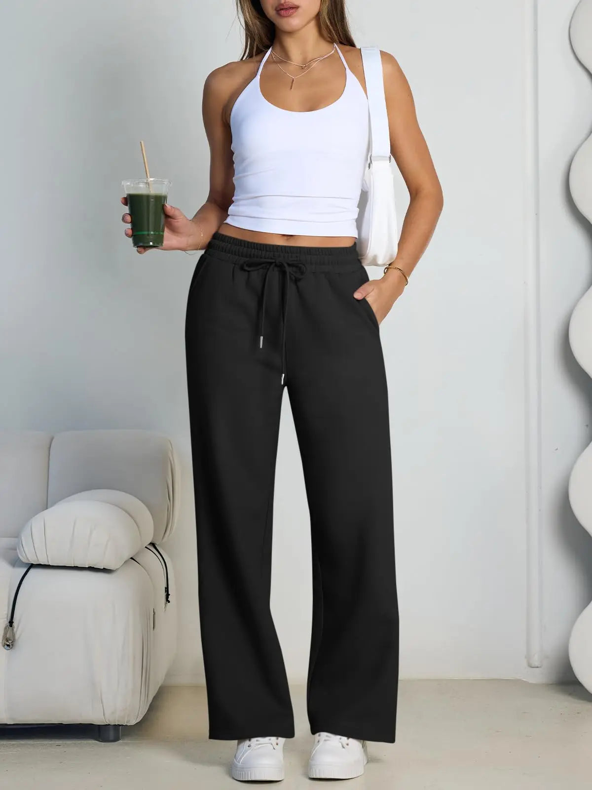 Pantalón deportivo gris de mujer de pernera ancha