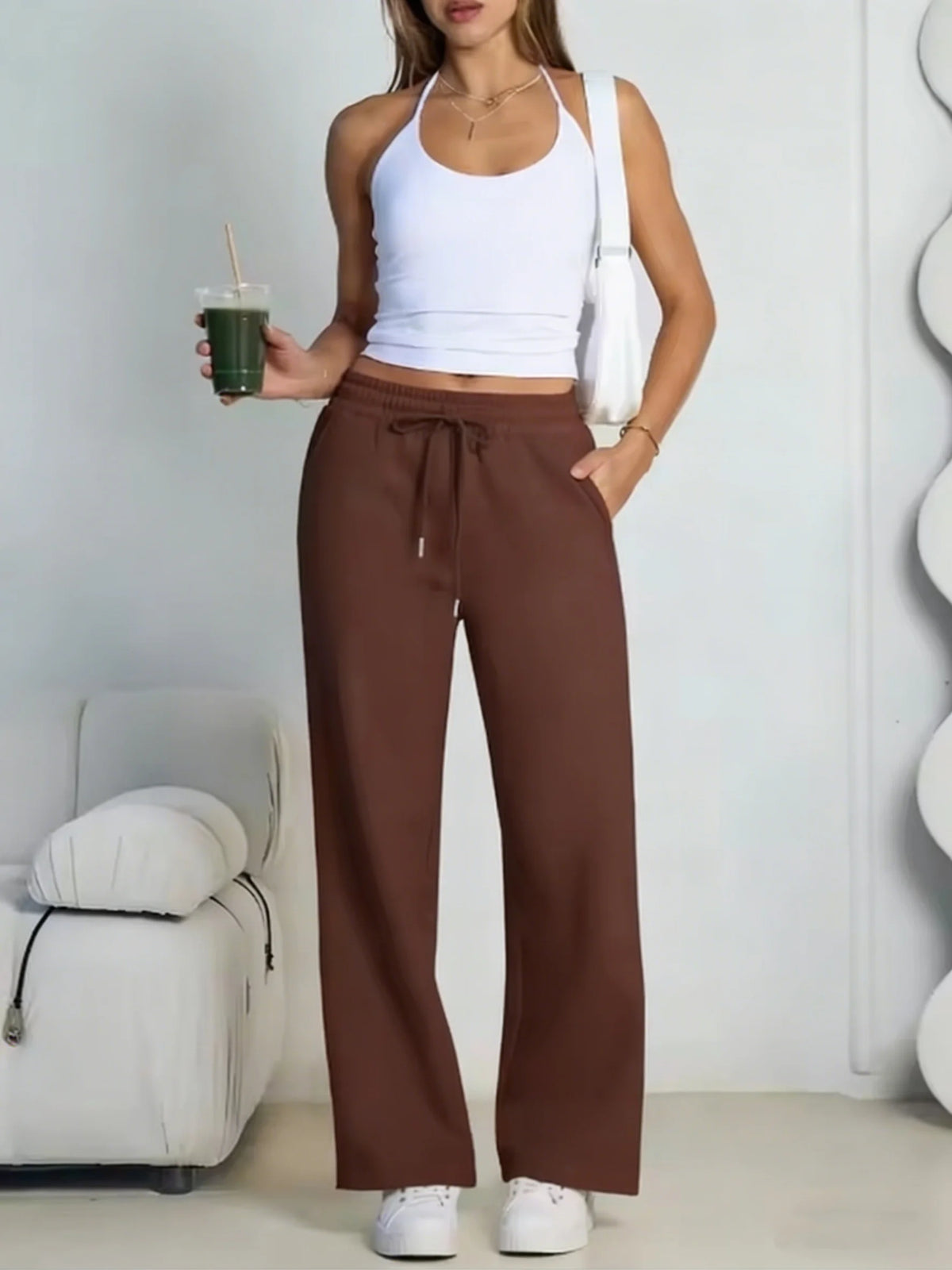 Pantalón deportivo gris de mujer de pernera ancha