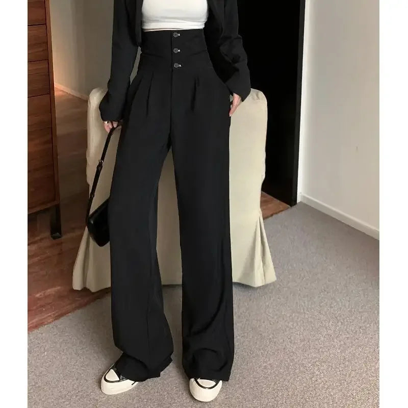 Pantalón negro de mujer de cintura alta con bolsillos