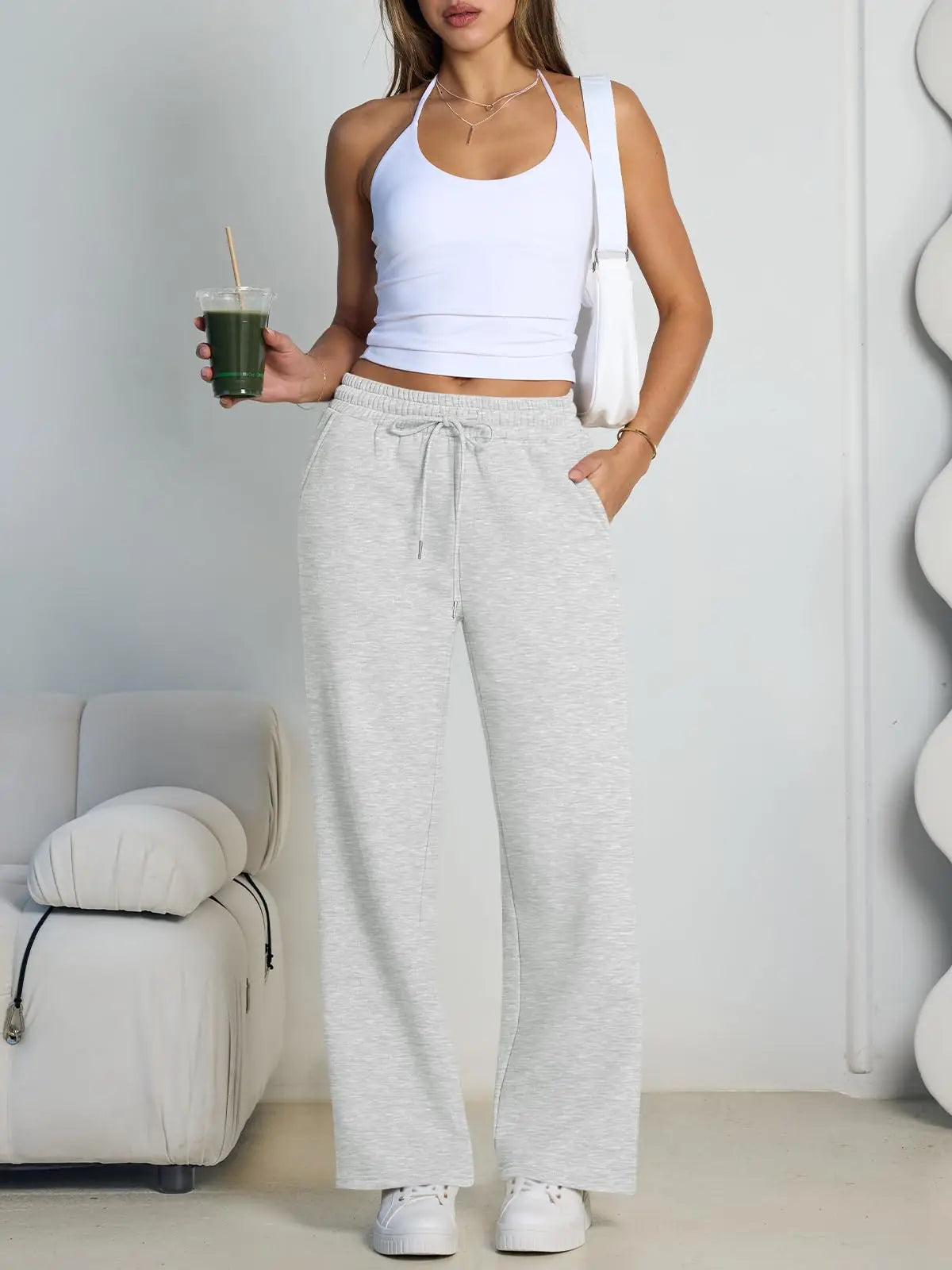 Pantalón deportivo gris de mujer de pernera ancha