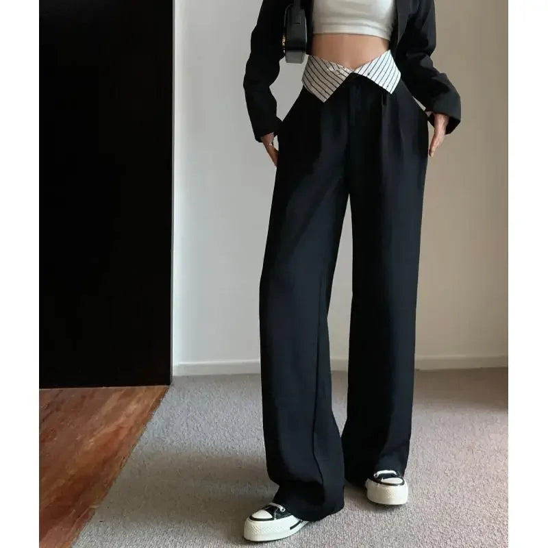 Pantalón negro de mujer de cintura alta con bolsillos