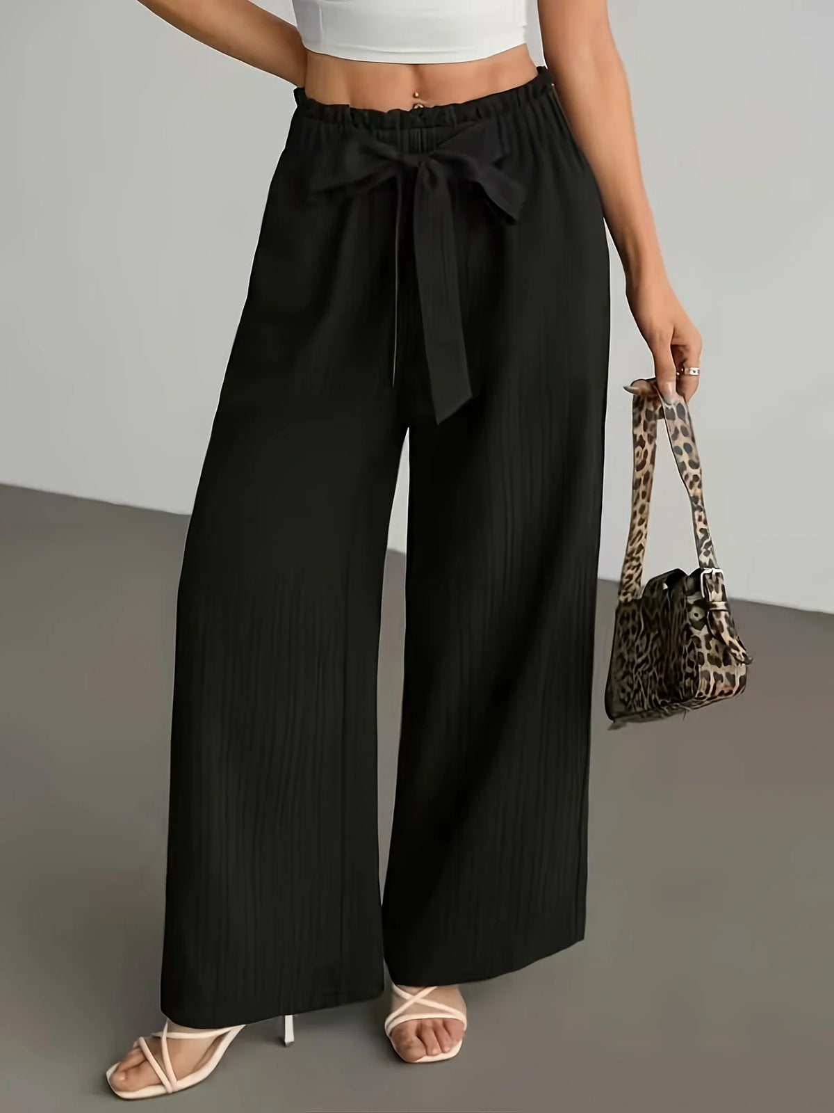 Pantalón ancho de mujer con cintura fruncida y lazo
