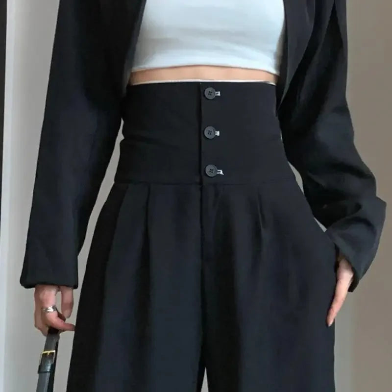Pantalón negro de mujer de cintura alta con bolsillos