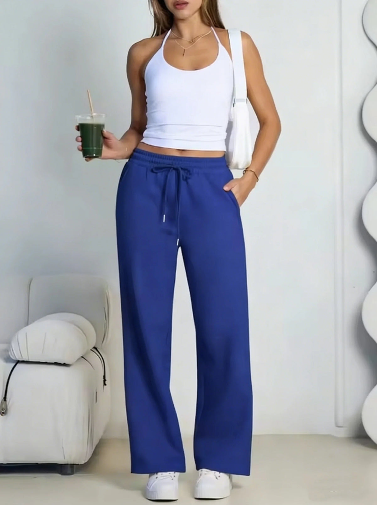 Pantalón deportivo gris de mujer de pernera ancha