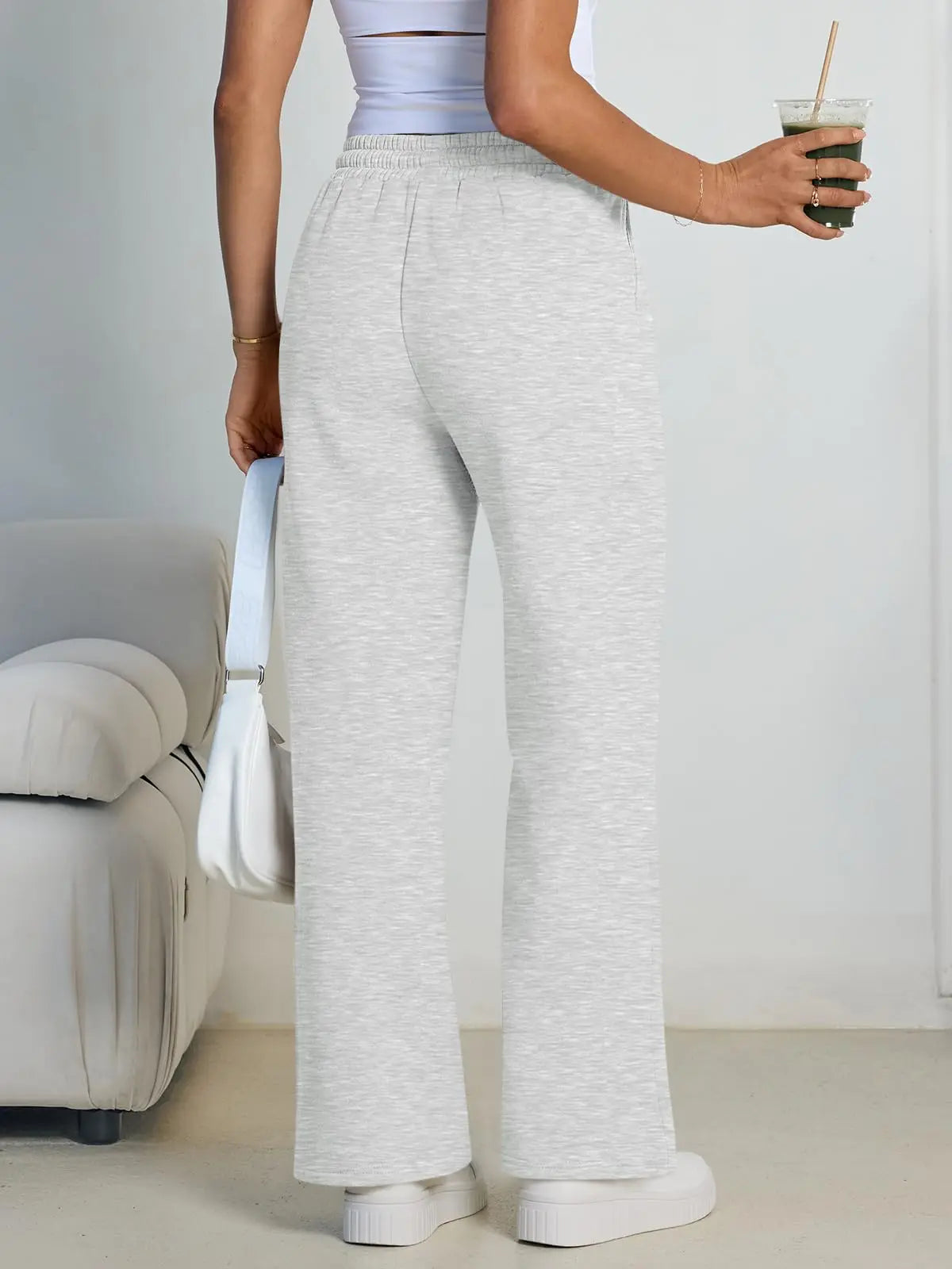 Pantalón deportivo gris de mujer de pernera ancha